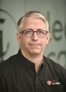 Portrait of a man smiling.