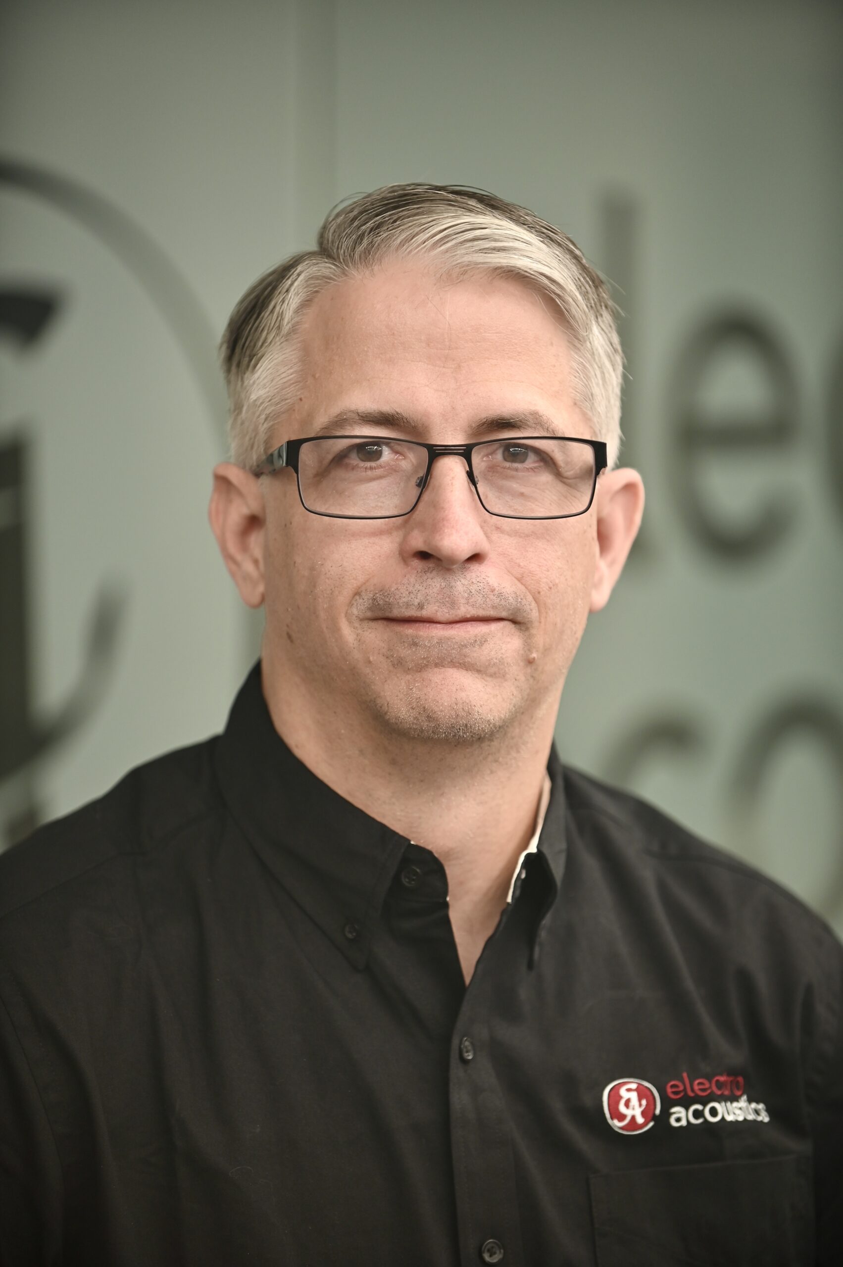 Portrait of a man smiling.