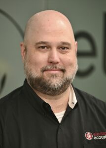 Man with beard smiling